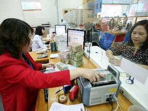 Phấn đấu đến cuối năm 2015 xử lý được cơ bản số nợ xấu hiện nay.