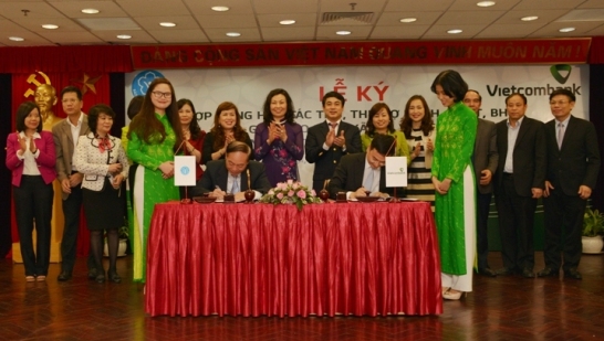 Ký hợp đồng hợp tác thu, thu nợ BHXH, BHYT, BHTN giữa Vietcombank và BHXH VN